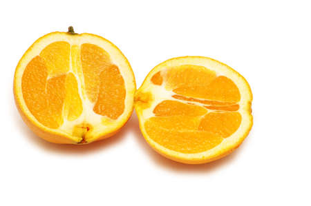 Two pieces of orange isolated on white