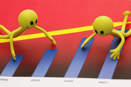 Figures of smilies having discussion over the chartの写真素材