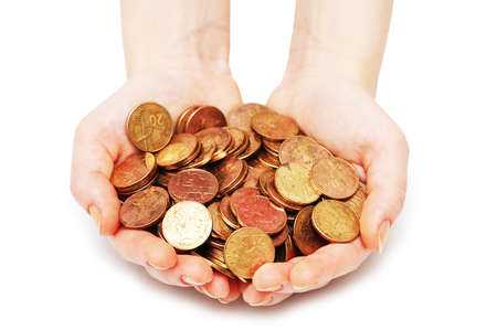 Hands holding many coins isolated  on white