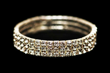 Bracelet with diamonds isolated  on the blackの写真素材