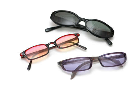 Three pairs of sunglasses isolated  on whiteの写真素材