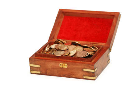 Chest full of coins isolated  on whiteの写真素材