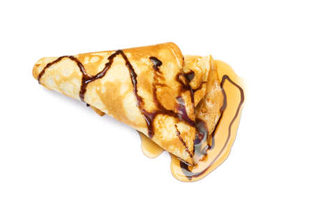Pancake with honey covered with chocolate syrupの写真素材