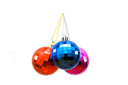 Christmas balls of various colours isolated on whiteの写真素材