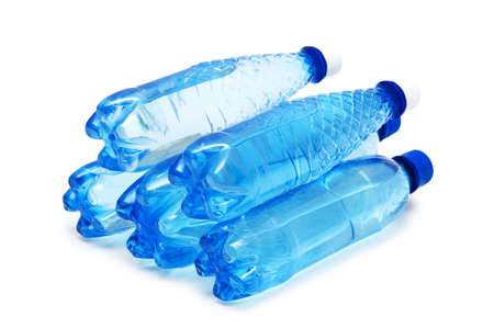 Stack of water bottles isolated on white