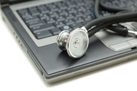 Stethoscope and laptop illustrating concept of digital security