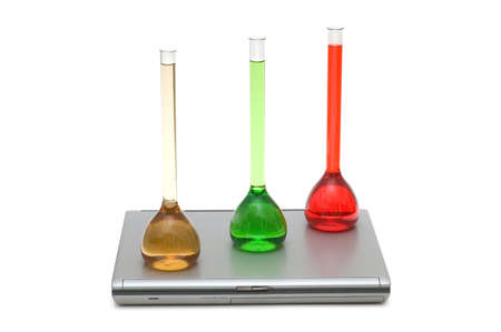 Tubes and laptop isolated on the white