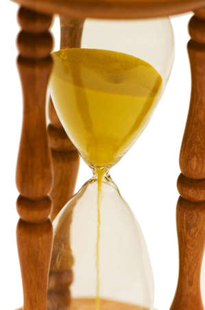 Close up of hourglass isolated on the white
