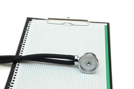 Stethoscope on the binder isolated on whiteの写真素材