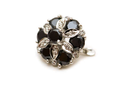 Earring with balck and silver stones isolated on whiteの写真素材