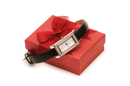 Watch and red giftbox isolated on the whiteの写真素材