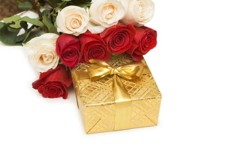 Giftbox and roses isolated on the whiteの写真素材