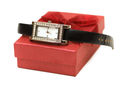 Watch and red giftbox isolated on the whiteの写真素材