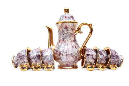 Cups and kettle isolated on white backgroundの写真素材