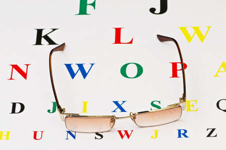 Opical glasses over the eye test tableの写真素材