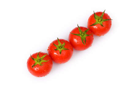 Row of tomatoes isolated on the white backgroundの写真素材