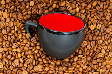 Cup and coffee beans isolated on the  whiteの写真素材