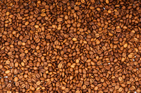 Close up of freshly roasted coffee beansの写真素材