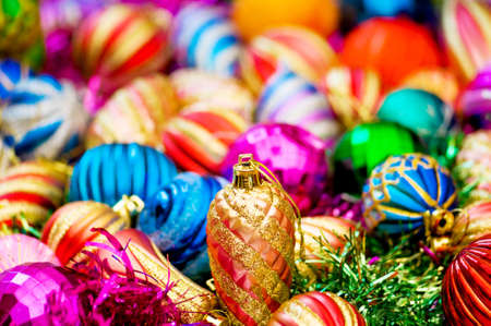 Colourful christmas decoration on a shiny backgroundの写真素材