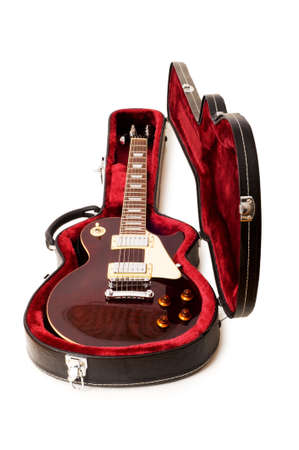 Guitar in open case isolated on the white backgroundの写真素材