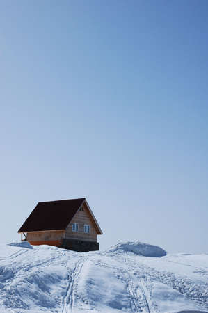 Lonely house in bright sunny winter dayの写真素材