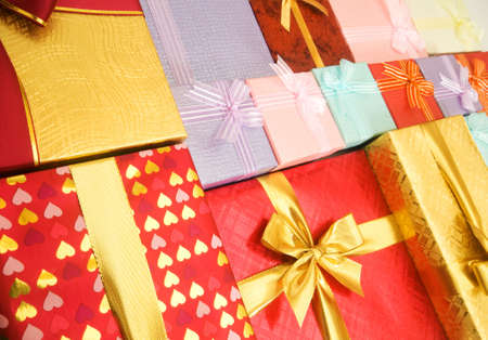 Close up of gift boxes with golden ribbonsの写真素材