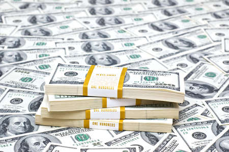 Background with many american hundred dollar billsの写真素材