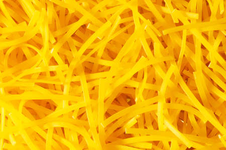 Extreme close up of yellow italian pasta