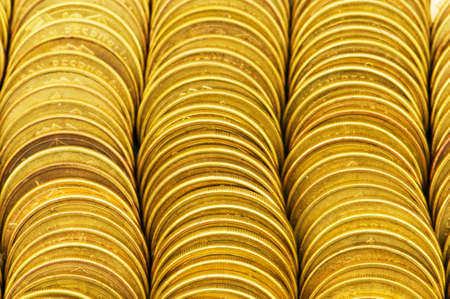 Close up of the golden coin stacksの写真素材