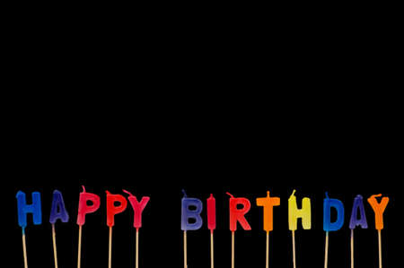 Happy birthday isolated on the black backgroundの写真素材