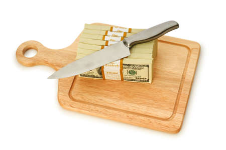 Money concept - cutting dollars with the knifeの写真素材