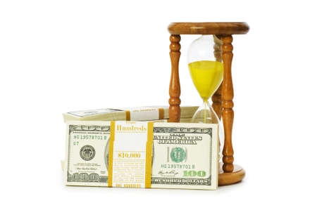 Time is money concept with dollars and hourglass