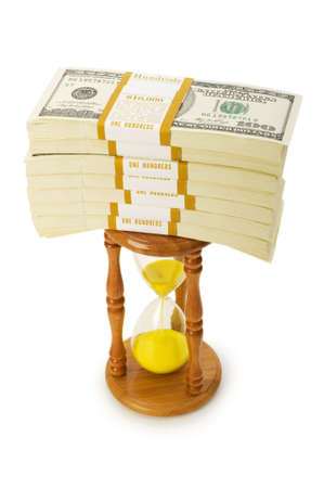 Time is money concept with dollars and hourglass