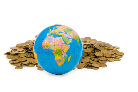 Globe and coins isolated on the white background の写真素材