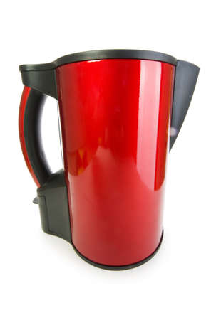Red electrical kettle isolated on whiteの写真素材