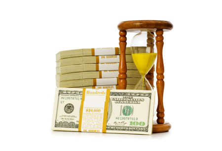 Time is money concept with dollars and hourglass
