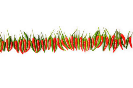 Red chili peppers isolated on the whiteの写真素材