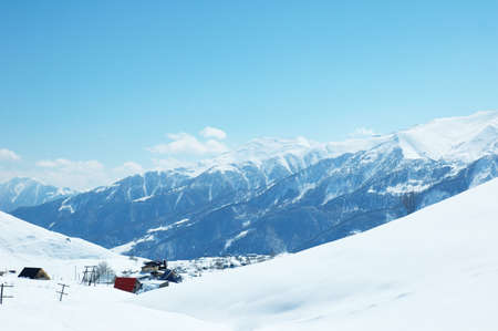 High mountains under snow in the winterの写真素材