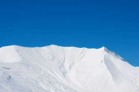 High mountains under snow in the winterの写真素材