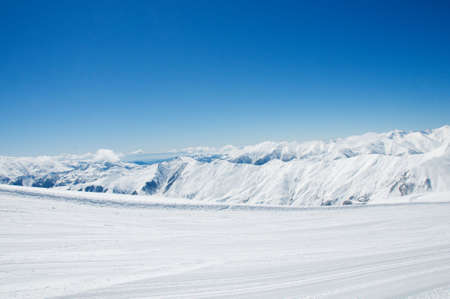 High mountains under snow in the winterの写真素材