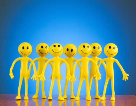 Leadership concept with smilies against gradient backgroundの写真素材