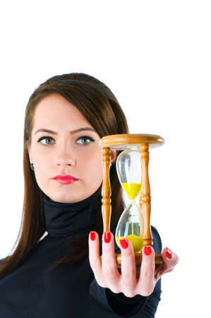 Woman with hourglass isolated on the white