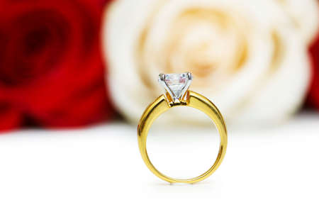 Wedding concept with roses and golden ringsの写真素材