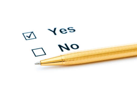 Check boxes and pen isolated on the white