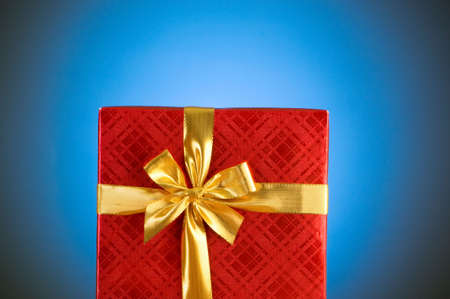 Gift box against gradient backgroundの写真素材