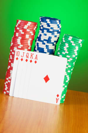 Stack of casino chips against gradient background