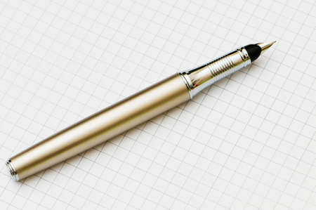 Close up of ink pen on the paperの写真素材