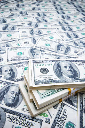Stack of dollars on money background