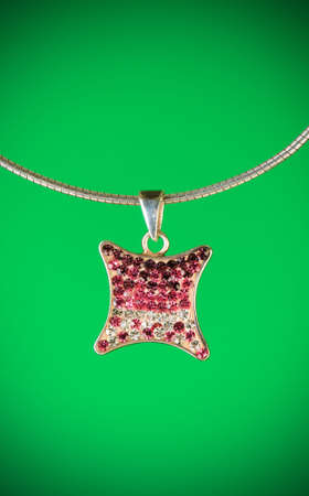 Pendant against colour gradient backgroundの写真素材