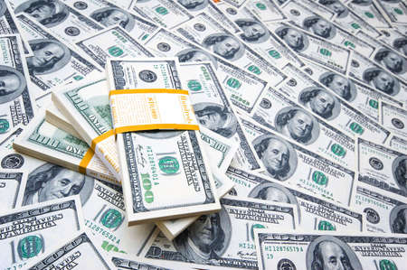 Stack of dollars on money background